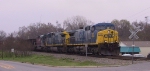 CSX 352 leads a train through town